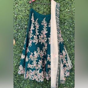 Beautiful hand embroidered Green lehnga choli with dupatta